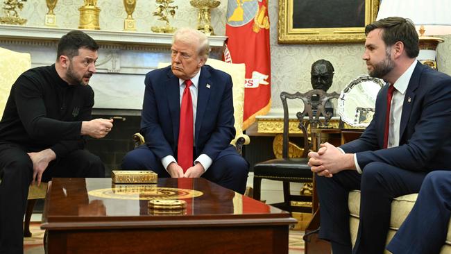 Ukraine's President Volodymyr Zelensky speaks to US Vice President JD Vance as they meet with President Donald Trump in the Oval Office of the White House.