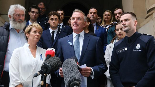 The parents of Josh Prestney, Andrew and Belinda, with his brother Alex Prestney and other family members outside the Supreme Court on April 14, 2021. Picture: Luis Ascui