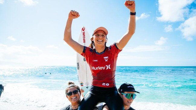 Molly Picklum of Australia is chaired from the beach after winning the Hurley Pro Sunset Beach at Oahu, Hawaii. (Photo by Tony Heff/World Surf League)