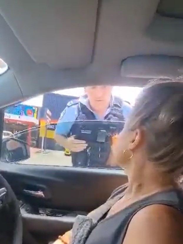 A stubborn woman has been pulled from her car during a traffic stop in Coffs Harbour after refusing to recognise police authority. Picture: Twitter