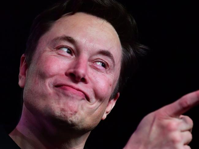 (FILES) In this file photo taken on March 14, 2019 Tesla CEO Elon Musk speaks during the unveiling of the new Tesla Model Y in Hawthorne, California. - A federal judge has cleared the way for a defamation trial against Elon Musk over his comments about a British cave rescuer after rejecting key arguments from the Tesla chief. US judge Stephen Wilson ordered a trial to begin December 3, 2019 in Los Angeles in the case that centers on Musk's tweets in a disagreement connected to the rescue of 12 boys from a cave in Thailand in July 2018. (Photo by Frederic J. BROWN / AFP)