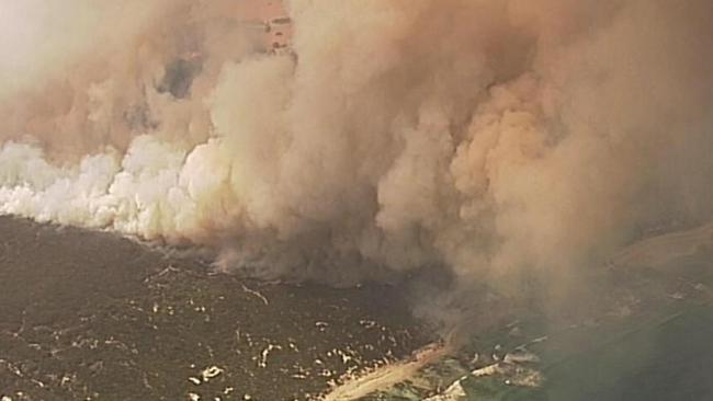 Flames are threatening the Vivonne Bay township on Kangaroo Island's southern coast, where an emergency warning is in place. Picture: 7 News Adelaide