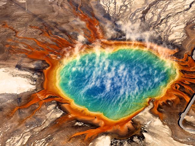 Image Name: Grand Prismatic Spring, Yellowstone Photographer Name: Jassen Todorov, 2nd place Image Description: I flew across the country to capture this spectacular natural wonder. At sunrise and 11,000 feet, I overcame high winds and turbulence while trying to maintain altitude and capture the right angle without people on the walkway. This place is not only remote but flying over mountains and high terrain is dangerous. While circling, I felt I didn't want to leave. There are just not enough words to describe magic. Picture: Jassen Todorov, 2nd place, USA National Award, 2015 Sony World Photography Awards