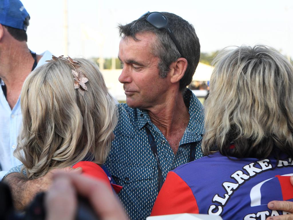 Gary Clarke hugs his wife Sharlene and daughter Ella after his horse Playoffs wins the Darwin Cup 2022. Picture: (A)manda Parkinson