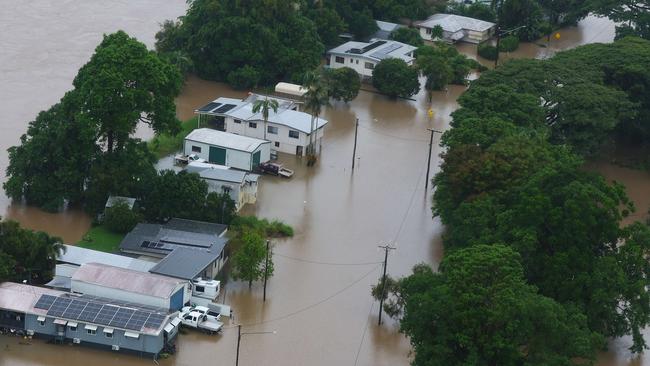 Premier of Queensland David Crisafulli heads for flood affected Cardwell onboard a helicopter to assess the damage, as seen here in the farming region around Macknade. Pics Adam Head