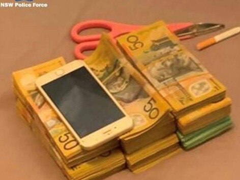 Police seized a total of $80,000 in cash from the searches around Tamworth. Picture: NSW Police