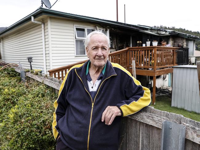 Ted Sherrin stands in his backyard of his Oakbank Avenue home in Montrose as his neighbours house caught fire last night.  Picture: Zak Simmonds