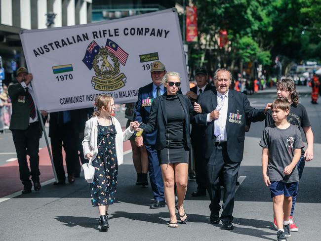 Robert O’Brien and family in Brisbane for the 2023 ANZAC Day March. Picture: NCA NewsWire / Glenn Campbell