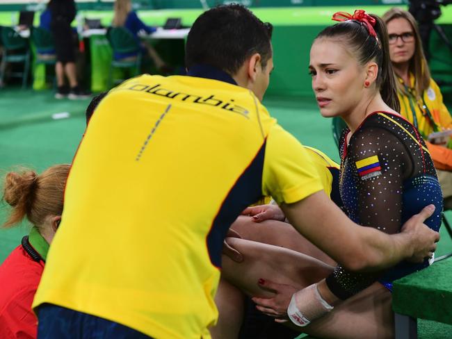 Colombia’s Catalina Elena Escobar Gomez is injured during qualifying for the women’s Artistic Gymnastics at