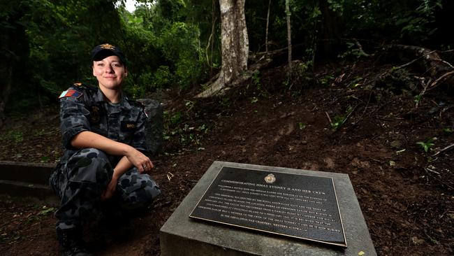 Sub Lieutenant Meeka Brooks, with the memorial to HMAS Sydney II on Christmas Island. Picture: Colin Murty