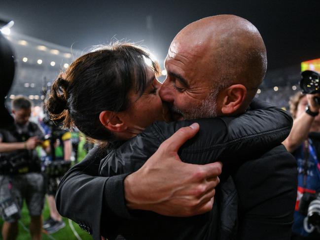 Pep Guardiola celebrates with his wife Cristina Serra after the team's victory. (Photo: David Ramos/Getty Images)