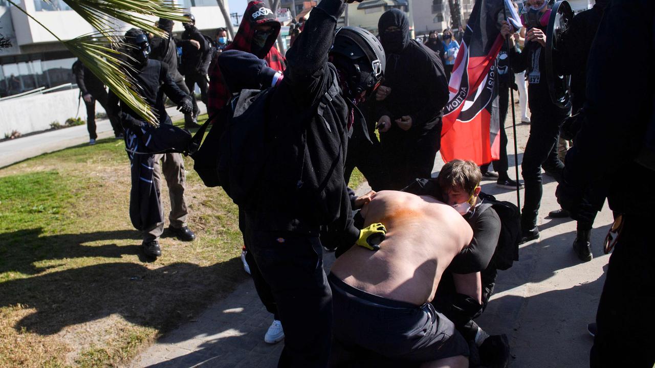 Counter-protesters clashed with pro-Trump demonstrators. Picture: Patrick T. Fallon/AFP