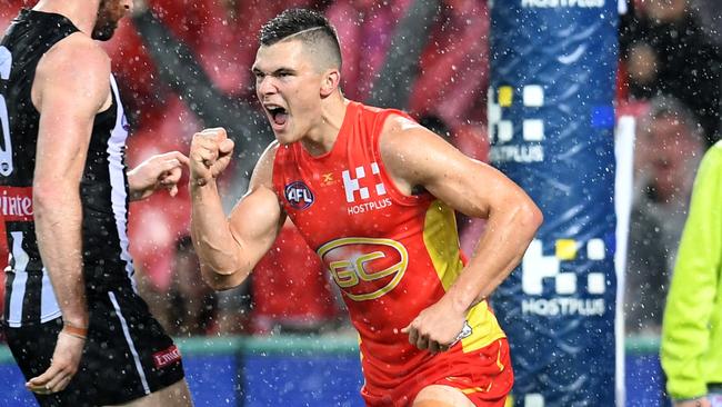 Ben Ainsworth celebrates a Gold Coast goal.