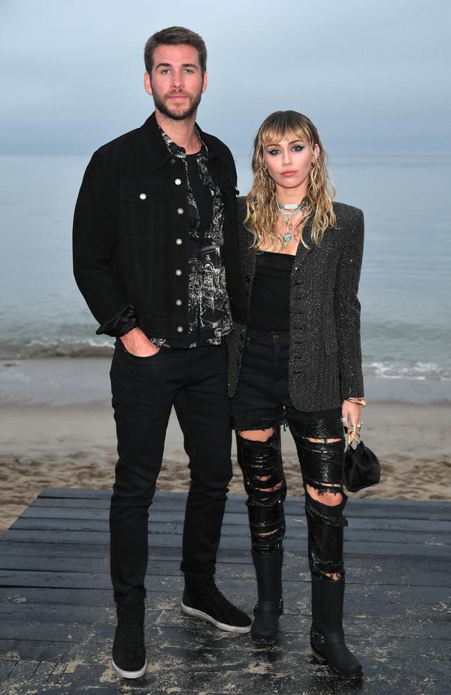 Liam Hemsworth and Cyrus attend the Saint Laurent Men’s Spring Summer 20 Show on June 6, 2019 in Malibu. Picture: Neilson Barnard/Getty Images