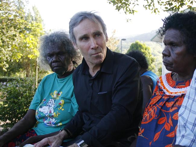 Traditional land owners of Aurukun, Aunty Martha Koowarta (left) and Dorothy Pootchemunka, and Mayor of Aurukun Neville Pootchemunka (right) talk with Greg McIntyre SC who is over from WA presenting a lecture at James Cook University.