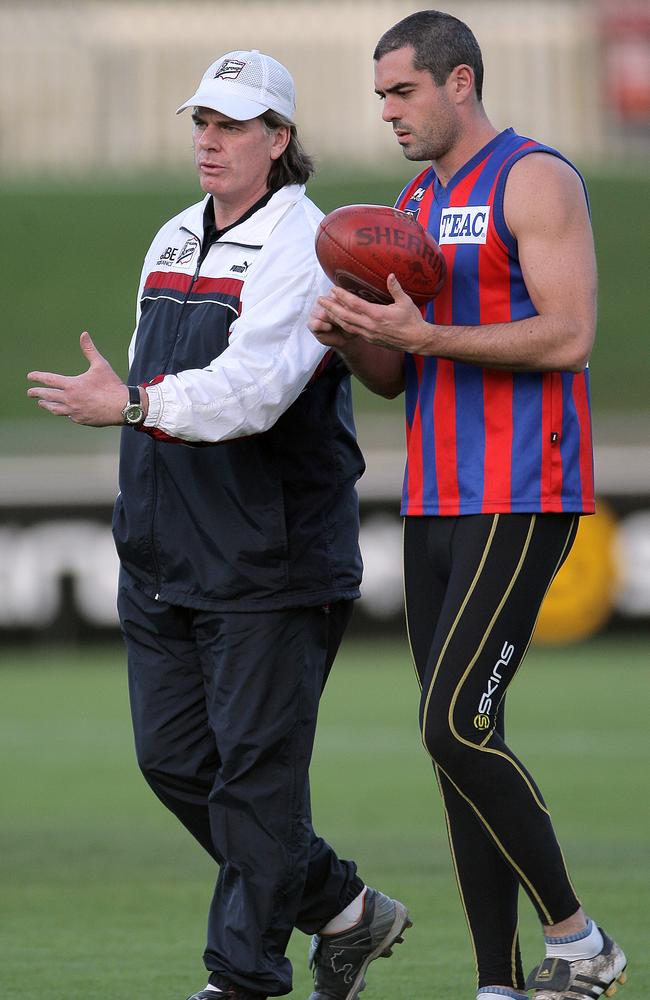 Gary Ayres during his first season at Port, talking tactics with Johnny Baird.