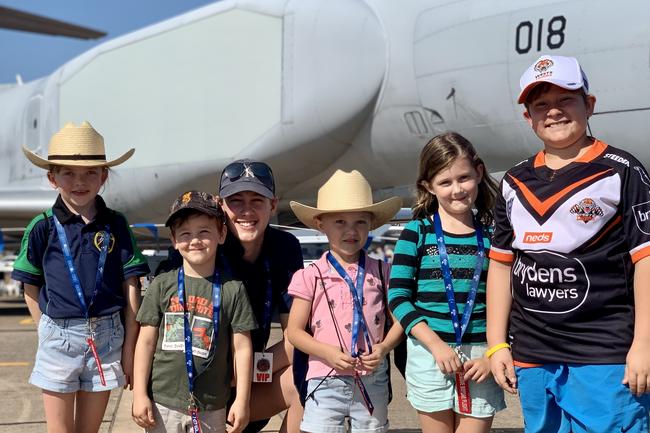 Having a blast are (from left) Killarney Rankin, 9, Hudson free, 3, Hudson Free, Lennix Rankin, 5, Charlotte Free, 5, and Hayden Manning, 11, at the Pitch Black Open Day at RAAF Darwin. Saturday, August 27, 2022. Picture: Tara Miko