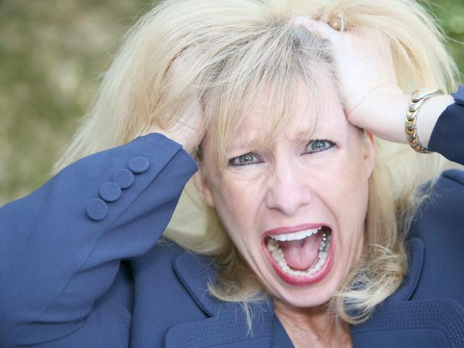 A woman going crazy. Angry retiree, senior, frustrated, generic woman