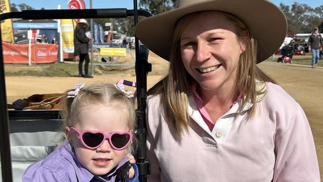 Emma Edyvean, 2, and her mum Sofie Edyvean of Wagga Wagga are pictured at the Henty Machinery Field Days. Picture: Nikki Reynolds