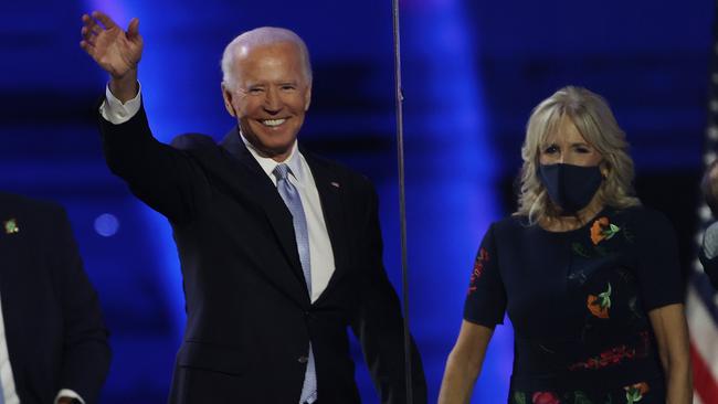 President-elect Joe Biden and his wife Jill Biden wave to the crowd after Biden’s address to the nation from the Chase Center in Wilmington, Delaware. Picture: AFP