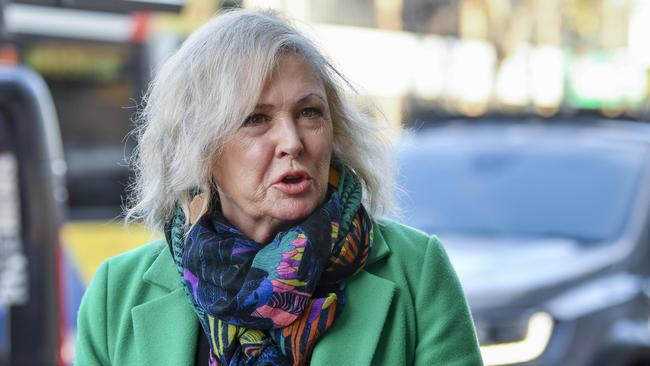 Lois Deverson speaks to media with local MP Stephen Patterson who saved her during an attack on Jetty Road Glenelg. Picture Mark Brake