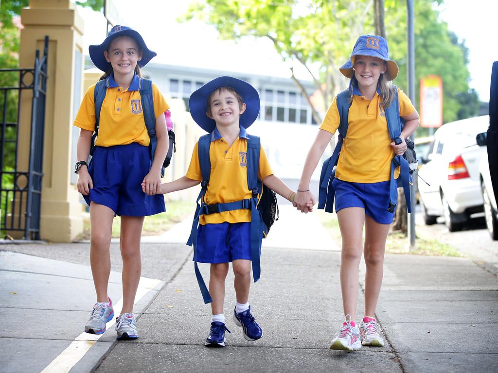 Milton State School students walking/cycling to school with Lord Mayor Graham Quirk and local Councillor Peter Matic (Councillor Matic is also CouncilÕs Public and Active Transport Chairman). The Active School Travel mascots, Red (stop) and Green (go) will also be walking to school with the group. The program has led to a 17 per cent reduction in car trips. Pictured is Ciara McAlpine, 10, Sam Worthington, 5, and Piper Wilson, 10 from Milton State school. Photo by Chris McCormack.