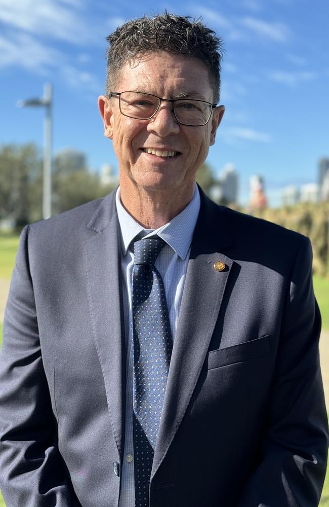 Hundreds more people including Gold Coast City Mayor Tom Tate and Southport MP Rob Molhoek (pictured) who has been recovering from a stroke and other local politicians have gathered at Broadwater Parklands for the second Anzac Day service including packs of students from a number of Gold Coast schools.