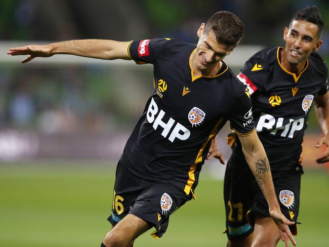 MELBOURNE, AUSTRALIA - DECEMBER 06: Tomislav Mrcela of the Glory (L) celebrates a goal during the round nine A-League match between Melbourne City and the Perth Glory at AAMI Park on December 06, 2019 in Melbourne, Australia. (Photo by Daniel Pockett/Getty Images)