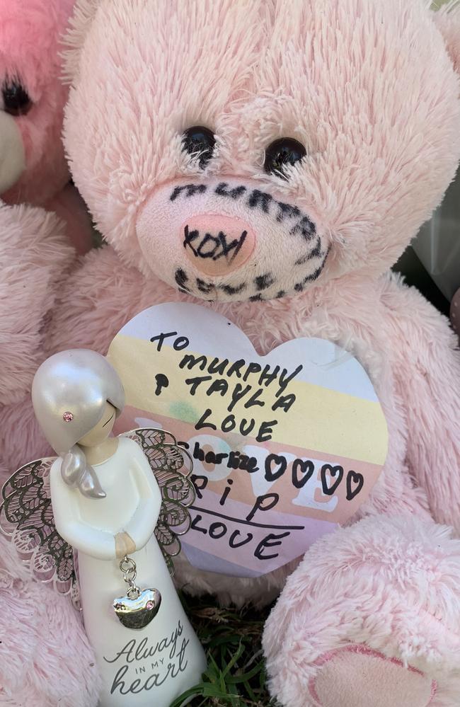 Tributes left by family, friends and members of the community at the house where Tayla Black and baby Murphy Margaret lived before allegedly murdered on August 8, 2023.