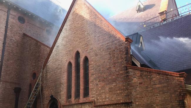 NSW Fire &amp; Rescue crews at the scene of the fire at St Carthage's Cathedral in Lismore. / Credit: Alison Paterson