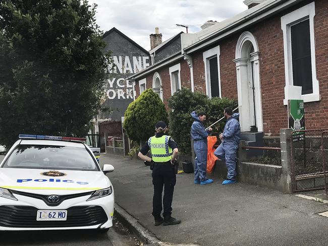 Tasmania Police at the scene of Ms Zhang’s death in Wellington Street, Launceston. Picture: Helen Kempton