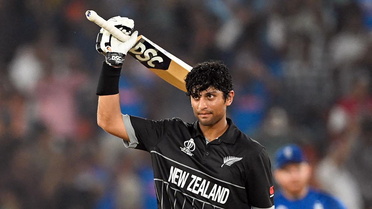 New Zealand's Rachin Ravindra becomes the third youngest player to score a century on World Cup debut. Photo by Punit PARANJPE / AFP