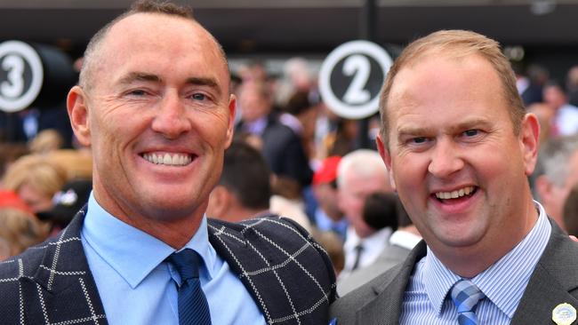 Trainer David Menuisier (CTR) poses with Jamie Lovett (L) after Chief Ironside won race 8, the Schweppes Crystal Mile, during Cox Plate Day at Moonee Valley Racecourse, Melbourne, Saturday, October 26, 2019. (AAP Image/Vince Caligiuri) NO ARCHIVING, EDITORIAL USE ONLY