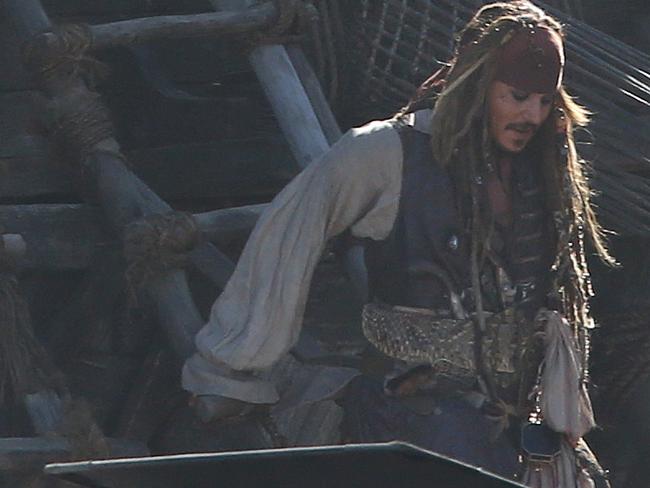 Johnny Depp films a scene on the Gold Coast set of Pirates of the Caribbean.