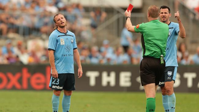 Sydney FC defender Rhyan Grant, left, is sent off against Melbourne City on Sunday. Picture: Getty Images
