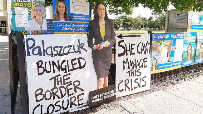 Signs outside Currumbin State School on polling day.