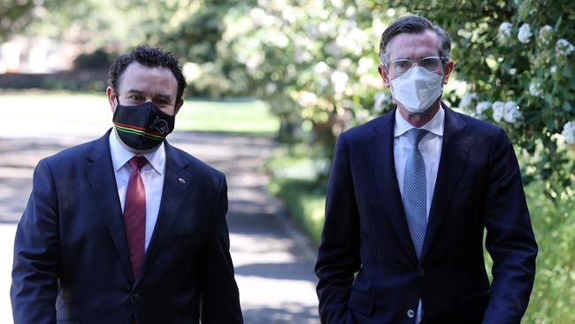 Stuart Ayres and Dominic Perrottet arrive at Government House in Sydney on Tuesday to be sworn in. Picture: David Swift