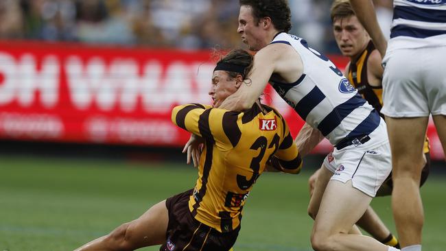 Jack Ginnivan wasn’t awarded a free kick for this high tackle against Geelong last week. Picture: Michael Klein