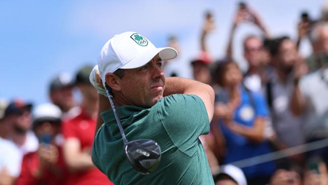 TOPSHOT - Ireland's Rory McIlroy competes in round 4 of the menâs golf individual stroke play of the Paris 2024 Olympic Games at Le Golf National in Guyancourt, south-west of Paris on August 4, 2024. (Photo by Emmanuel DUNAND / AFP)