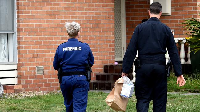 Forensic police search a property in Coolaroo. Picture: Nicole Garmston