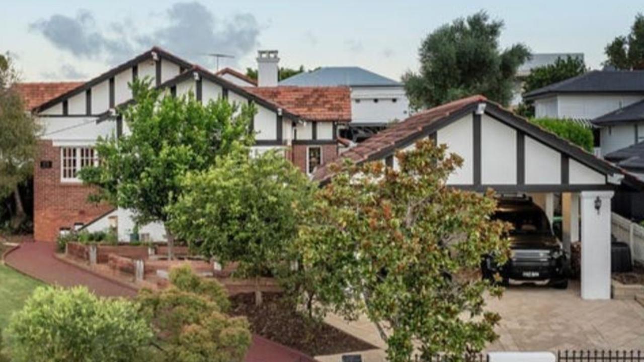 City’s most popular suburb turns heads in crowded auction sale