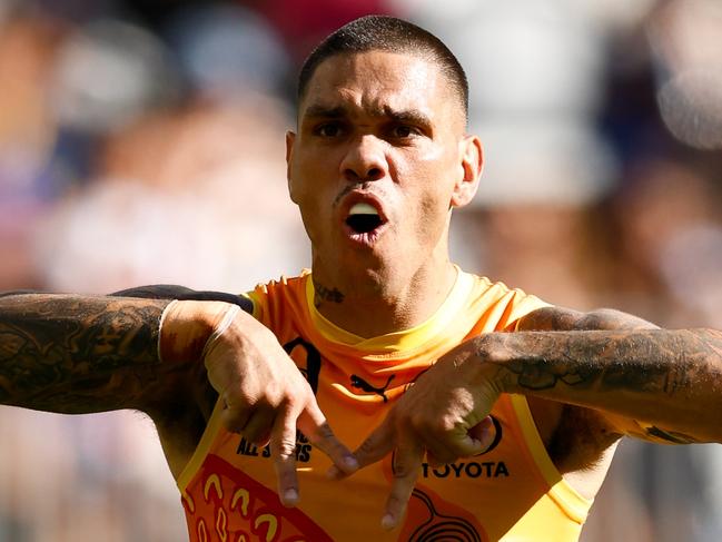 PERTH, AUSTRALIA - FEBRUARY 15: Michael Walters of the Indigenous All Stars celebrates a goal during the 2025 Toyota AFL Indigenous All Stars match between the Indigenous All Stars and the Fremantle Dockers at Optus Stadium on February 15, 2025 in Perth, Australia. (Photo by Dylan Burns/AFL Photos via Getty Images)