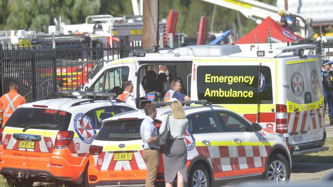 Mr White’s four co-workers were rescued from the roof. Picture: Jeremy Piper