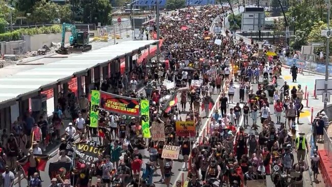 Thousands of protesters have marched during the 'Invasion Day' rally in Brisbane. Picture: Liam Kidston