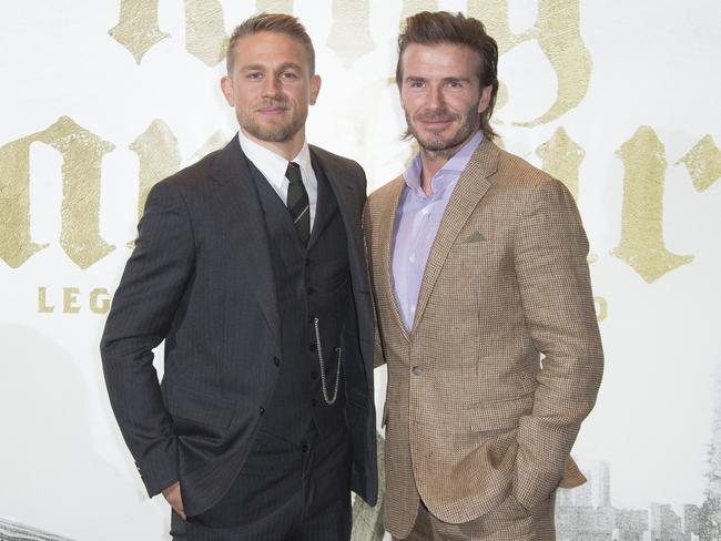 Charlie Hunnam with Beckham at the London premiere of King Arthur this week. Picture: Joel Ryan/Invision/AP