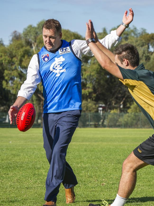 Andrew Balkwill says he pulls on the M&amp;M’s jumper every now and then. Picture: Thomas More College