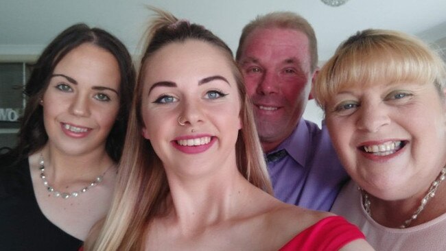 Point Cook building fire victim Abbey Forrest (left), with sister Emily and their mum and dad. Picture: Supplied