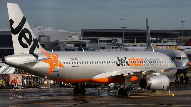 About 60 Jetstar passengers were forced to sleep at a Queensland airport after their Melbourne-bound flight was abandoned.