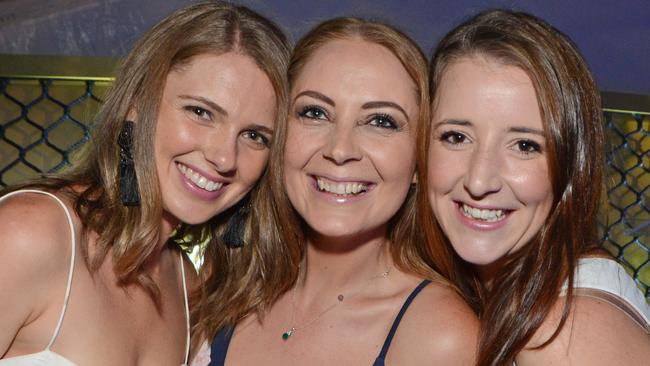 Holly Fallon, Courtney Breheny, Brodie Ward at Magic Millions launch party on Surfers Paradise beach. Picture: Regina King (copyright restrictions apply 07 55322193). Pic for Coast Confidential GC Bulletin use only.