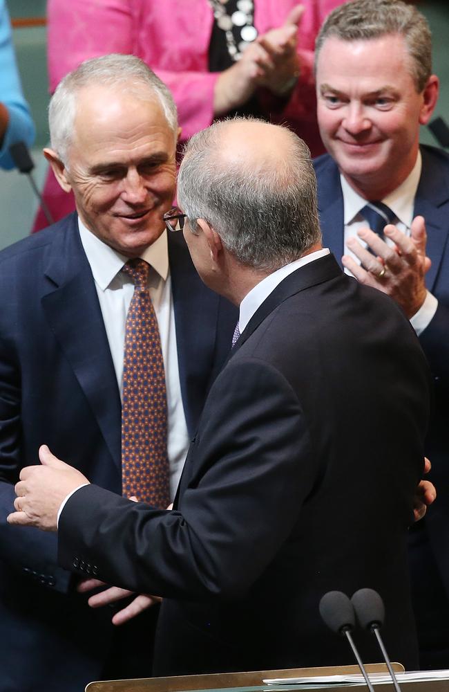 Prime Minister Malcolm Turnbull congratulates Treasurer Scott Morrison after he delivered the 2017 Federal Budget. Picture: Kym Smith